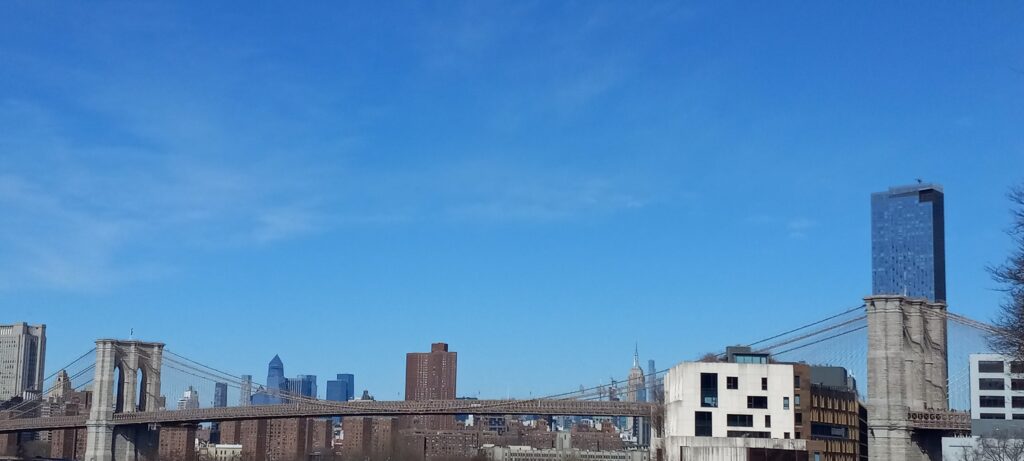 The Brooklyn Bridge and the Manhattan skyline seen from the Brooklyn Heights Promenade