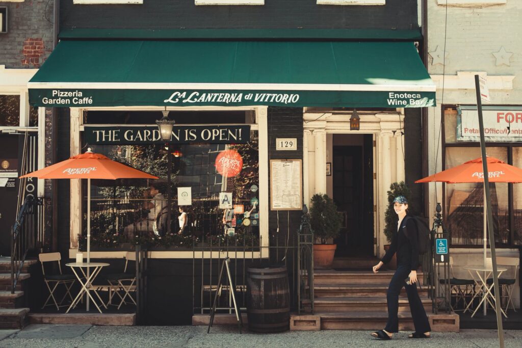 Umbrellas outside La Lanterna di Vittorio cafe on MacDougal Street, Greenwich Village