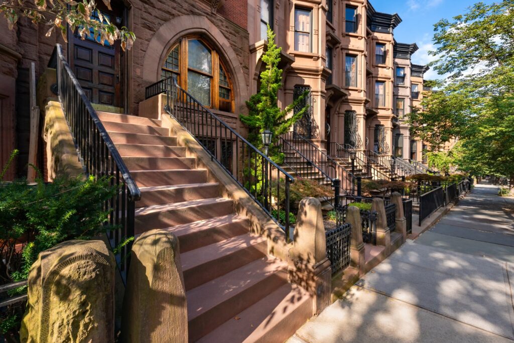 Brownstone townhouses on a leafy street in Park Slope, Brooklyn