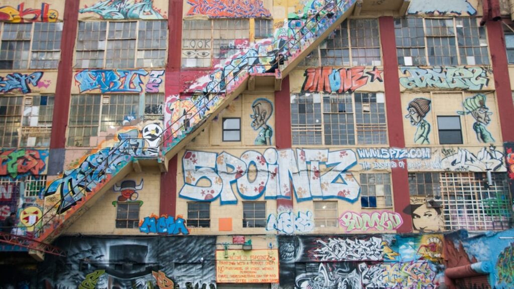 The 5Pointz building in Long Island City, Queens, covered in vibrant murals and graffiti art