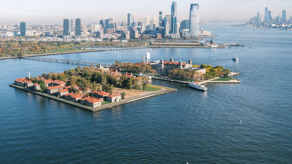 Ellis Island immigration hall in New York Harbor, gateway for millions of arriving immigrants