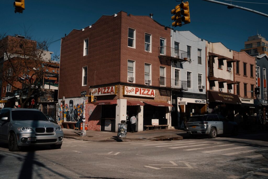 Joe's Pizza storefront on a Brooklyn street