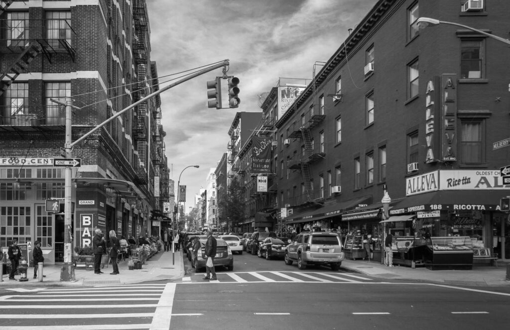 Mulberry Street at Grand Street in Little Italy, with Alleva Dairy on the corner, Manhattan