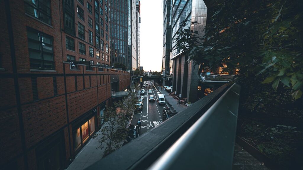 View from the High Line elevated park looking down at a Chelsea street in New York City