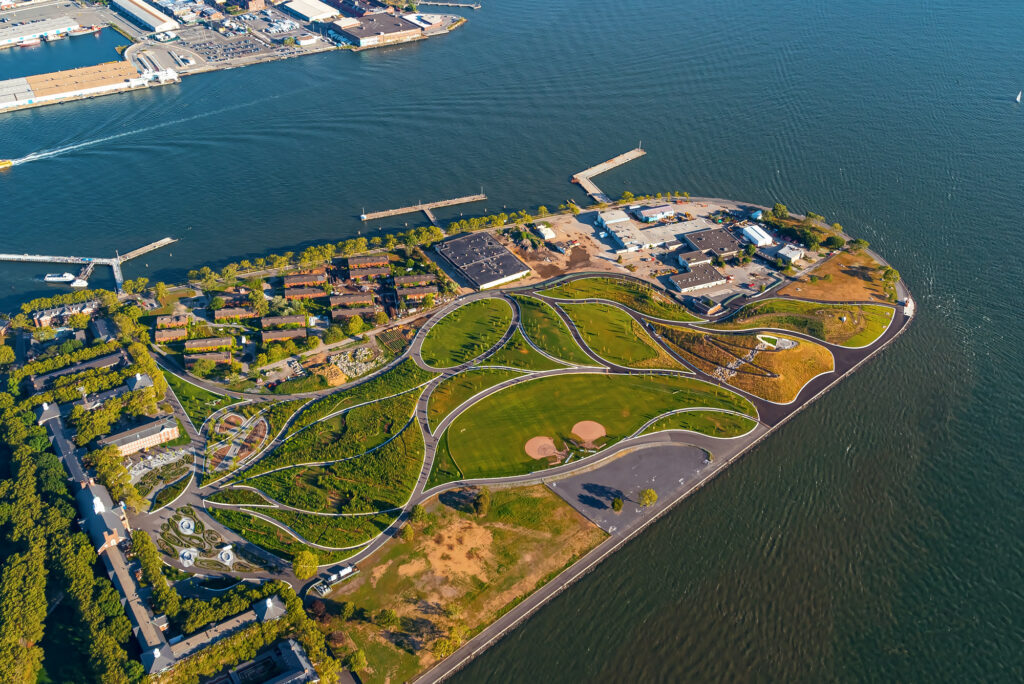 Aerial view of the lawns, curving paths and ball fields of Governors Island in New York Harbor