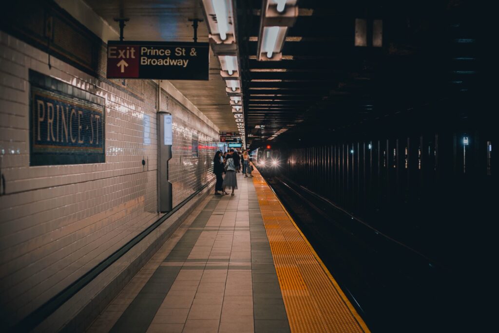 Passengers waiting on the Prince Street subway platform in New York City