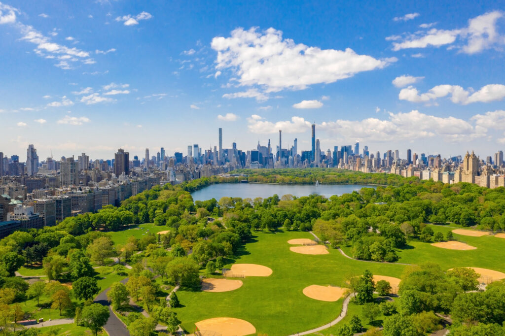 Aerial view south over Central Park toward Midtown Manhattan skyscrapers