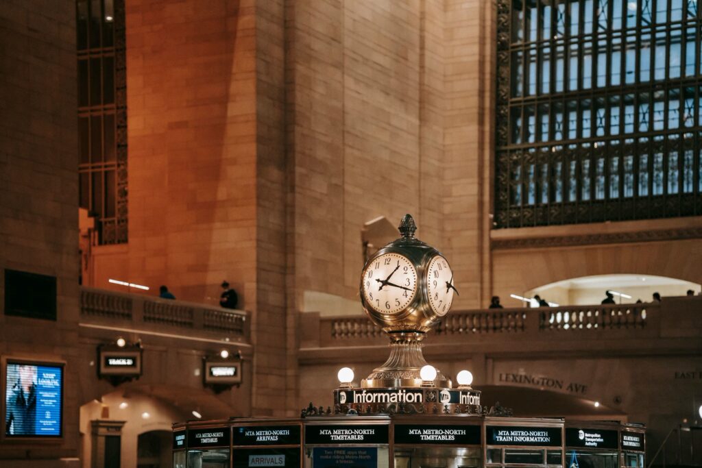 The four-faced clock on top of the information booth in the Main Concourse of Grand Central Terminal