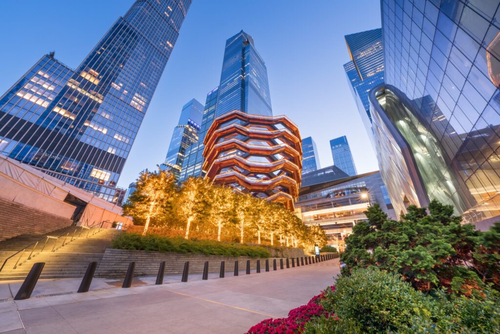 Hudson Yards public plaza and towers on Manhattan's West Side at blue hour