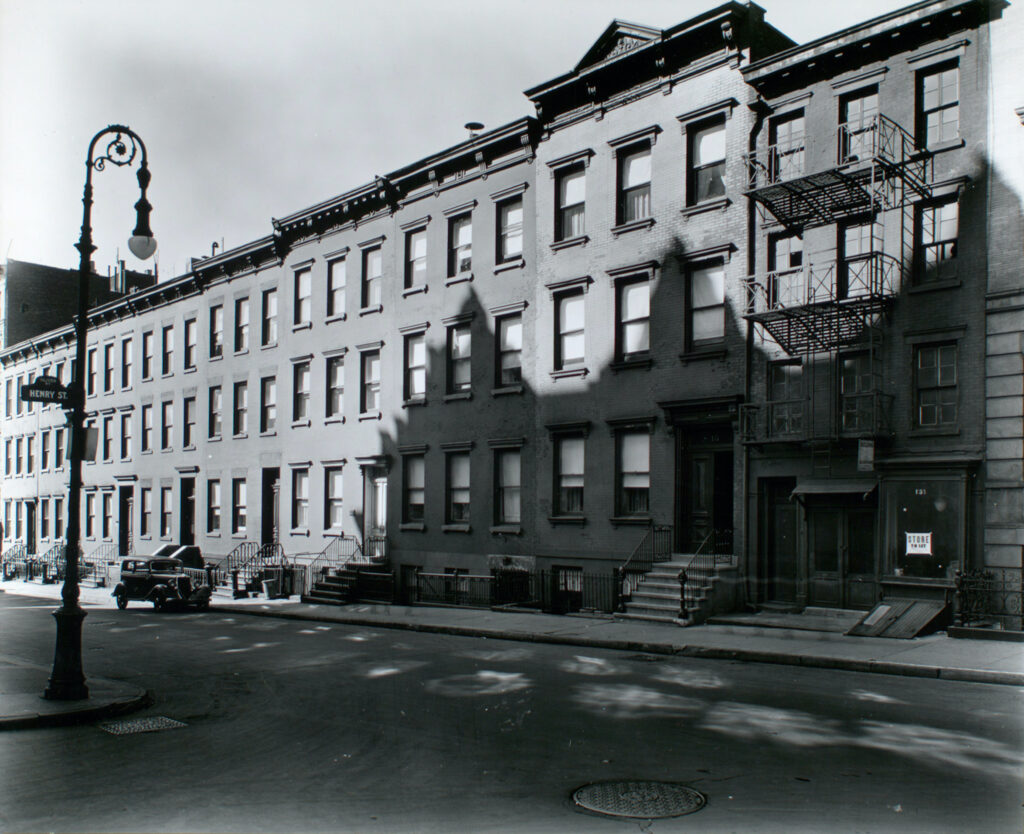 Row houses on Oliver Street at Henry Street, Lower East Side, photographed in 1937