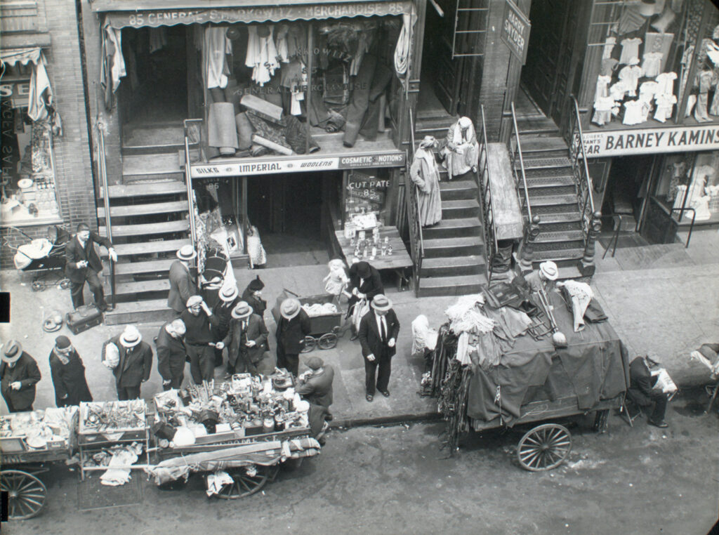 Hester Street between Allen and Orchard Streets on the Lower East Side, photographed by Berenice Abbott in the 1930s