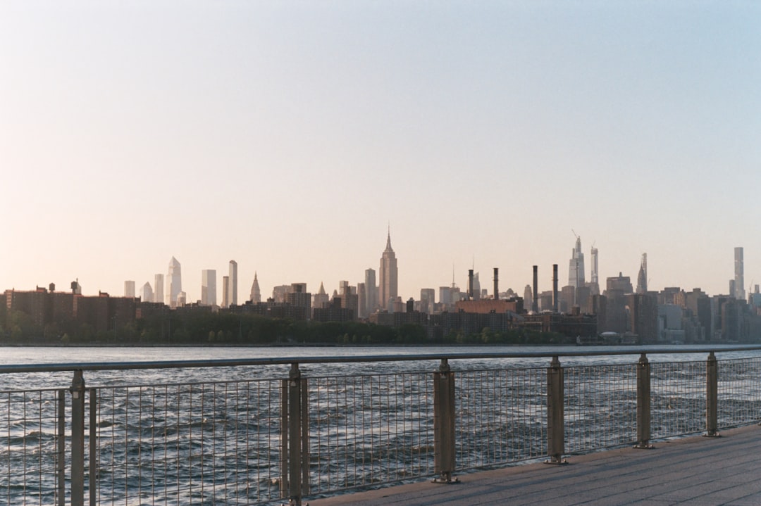 A quiet New York City street corner at golden hour