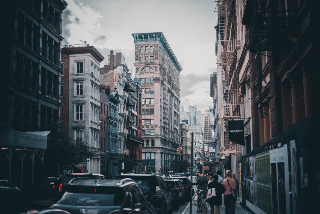 Ornate cast-iron and stone buildings above a busy street in SoHo
