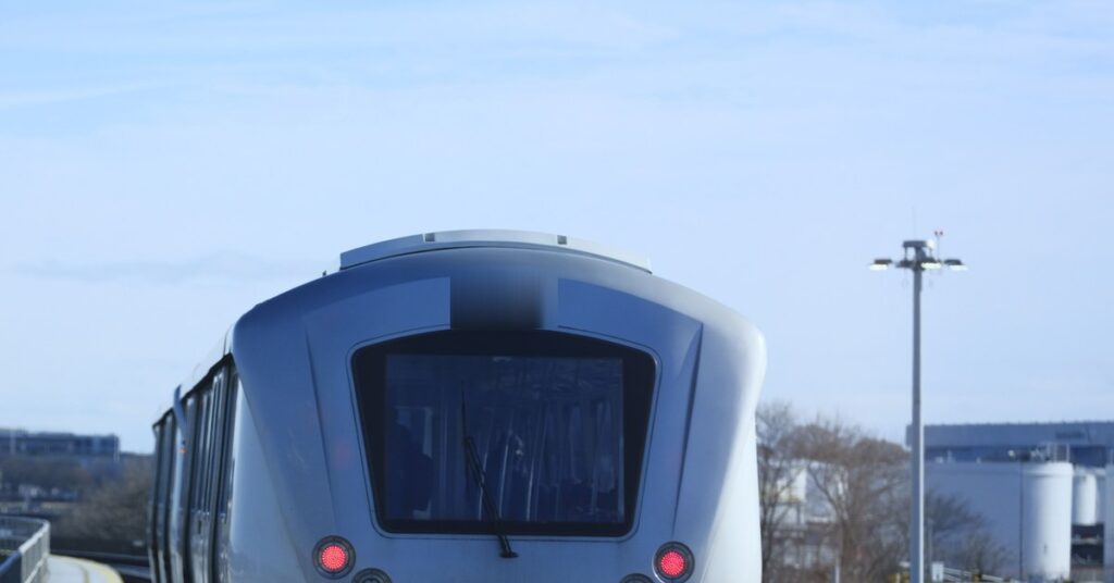 An AirTrain car arriving at a JFK Airport platform in Queens, New York