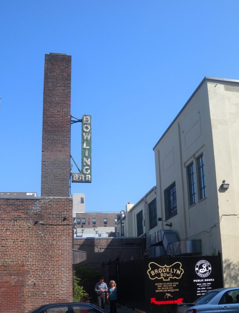 The neon Bowling Bar sign and Brooklyn Bowl entrance on Wythe Avenue
