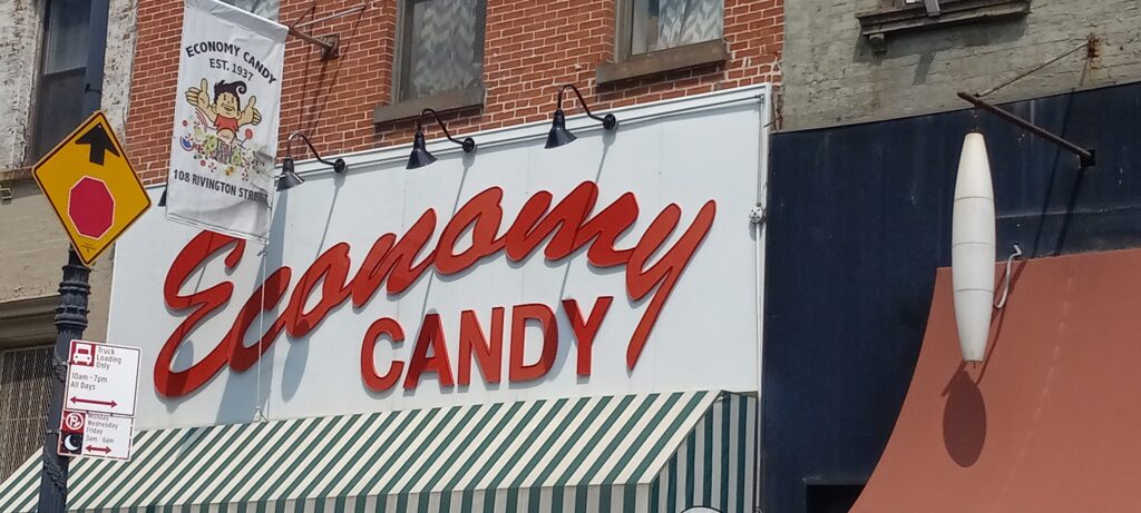 Economy Candy shop sign and green striped awning on Rivington Street