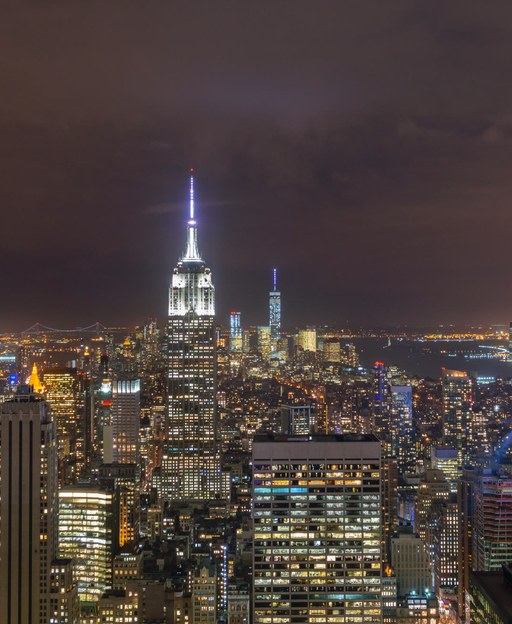 Midtown Manhattan and the Empire State Building lit up at night in New York City